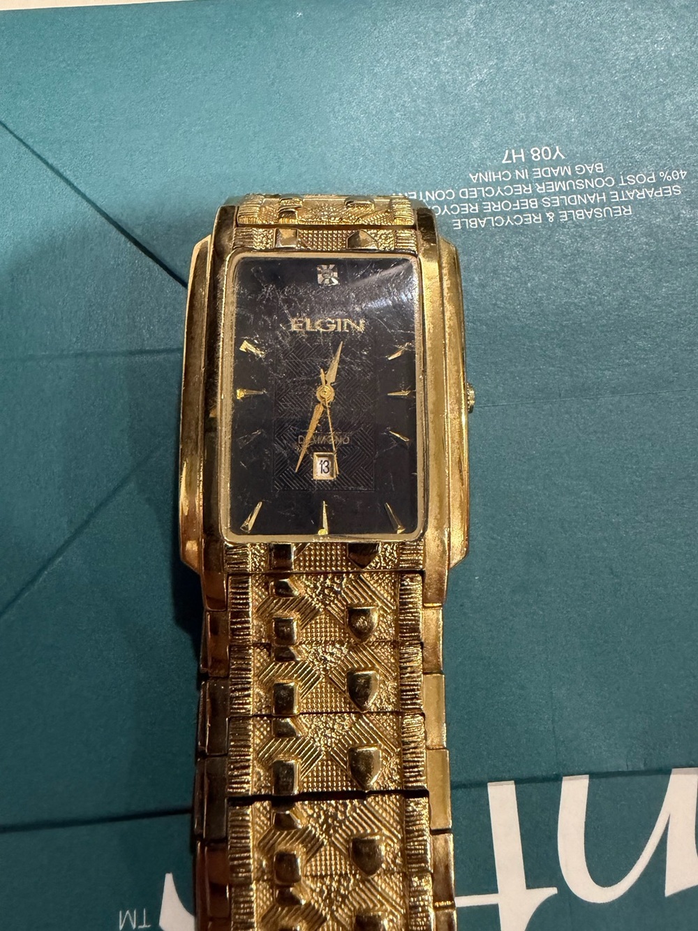 Gold-Tone Men's Dress Watch with Black Dial and Diamond Accent